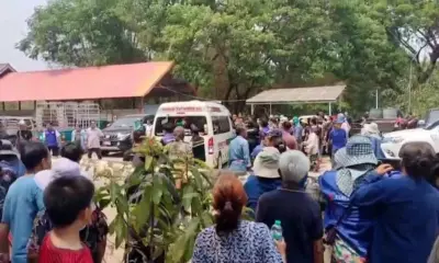 ชาวบ้านในลำปางประท้วง! พวกเขาปิดประตูวัดเพื่อป้องกันการเคลื่อนย้ายอัฐิของ "ครูบาญัต" หลังจากศูนย์ปฏิบัติธรรมชื่อดังแห่งหนึ่งอ้างสิทธิ์ความเป็นเจ้าของร่างของท่าน