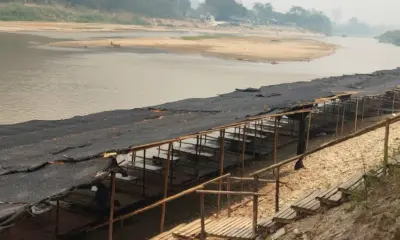 ชายหาดริมแม่น้ำเชียงรายที่เคยคึกคักกลับเงียบเหงาในวันสงกรานต์