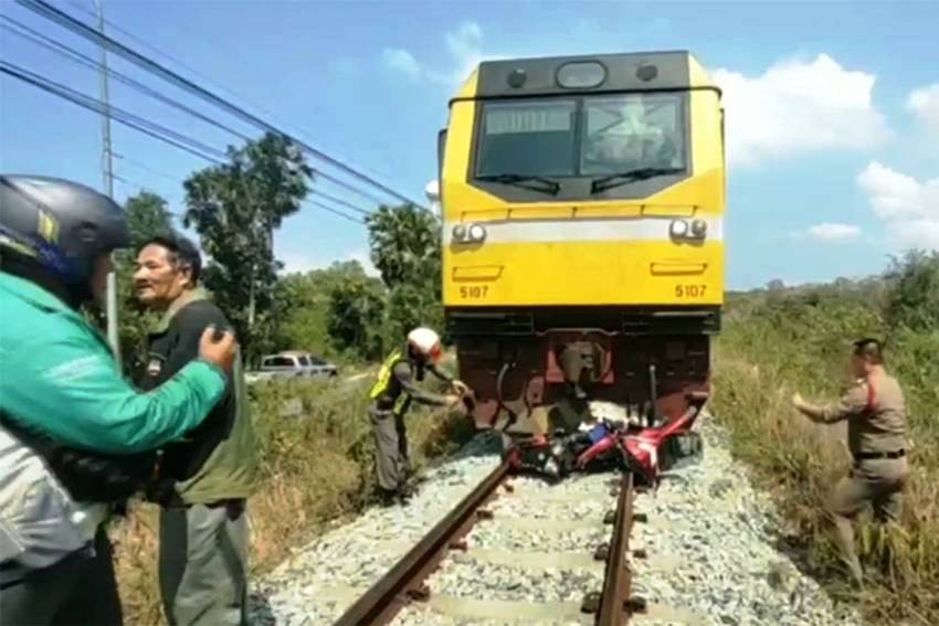 motorcycle hit by train in pattaya