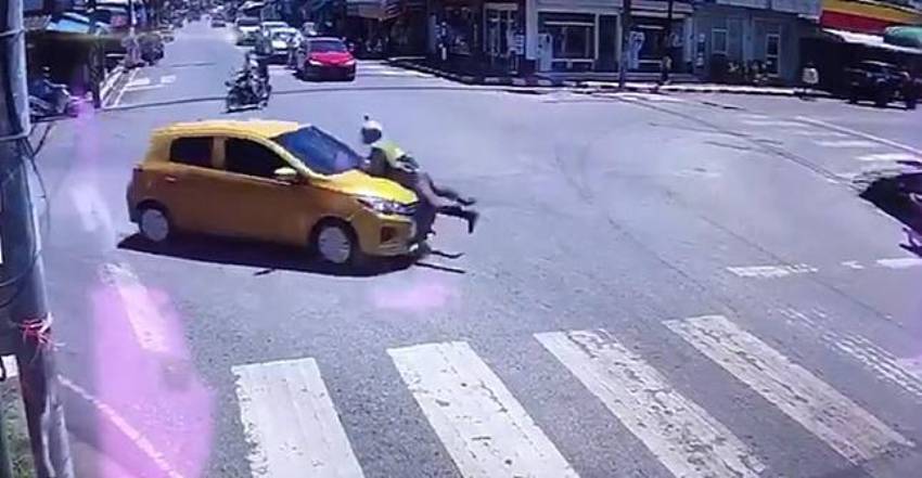 police man on mitsubishi hood