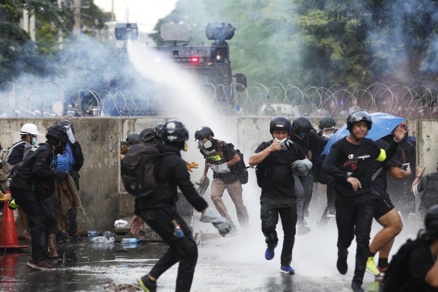 Thai Police and Anti-Government Protesters Clash Outside of Parliament