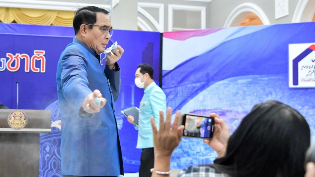 Frustrated Thai Prime Minister Sprays Hand Sanitizer on Reporters