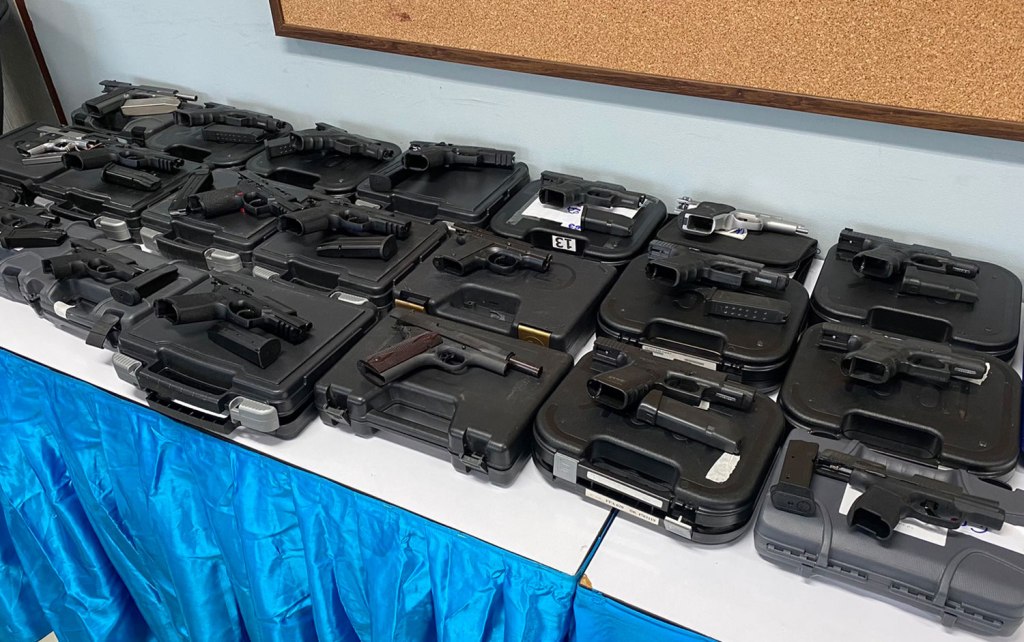 Crime Suppression Police Seize Large Cache Hand Guns and Ammunition