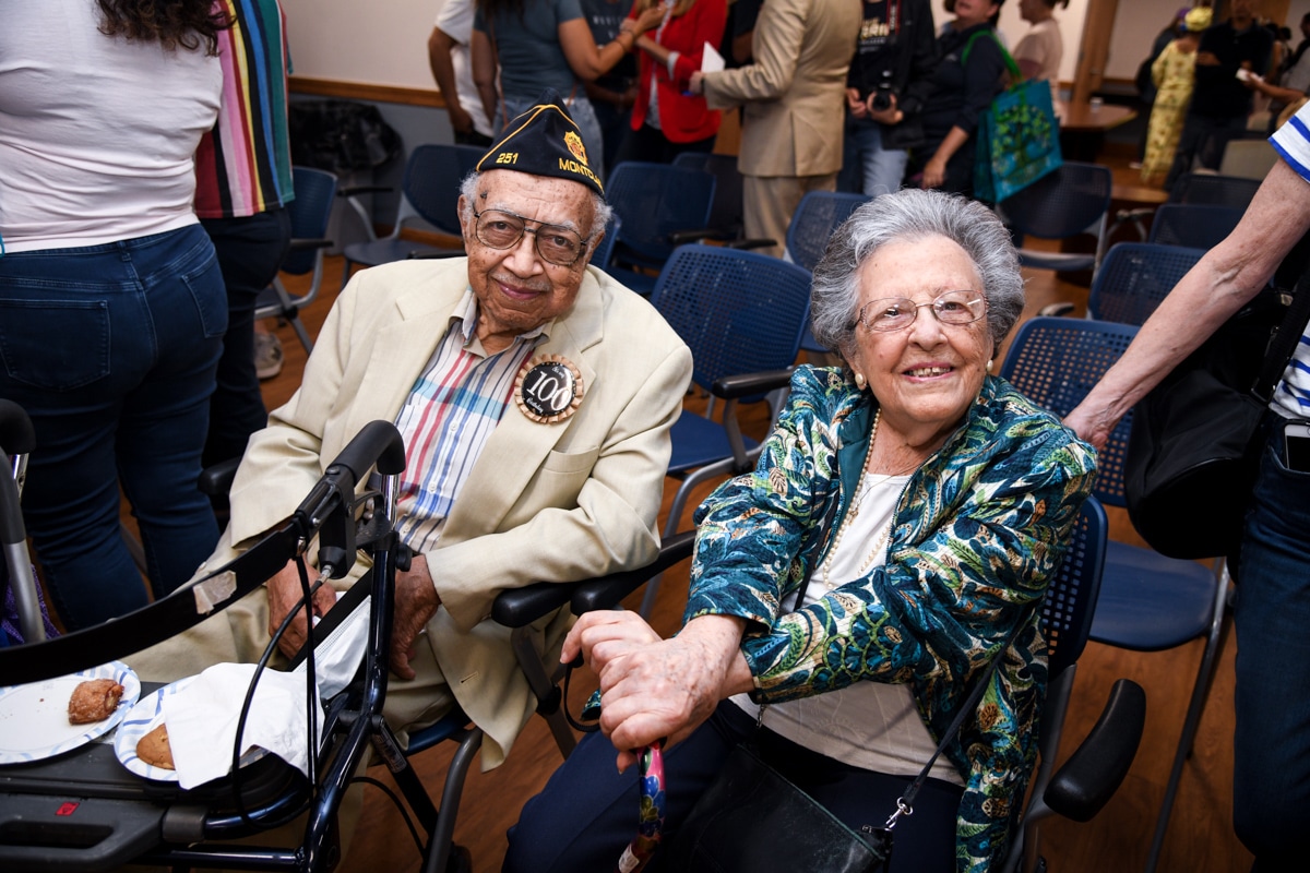 Once neighbors, Samuel Debman, who graduated Glenfield School in 1935, sits next to Molly DeCarlo, who graduated from Glenfield in 1934 at a ceremony after the Caravan of Heroes on July 3, 2021.