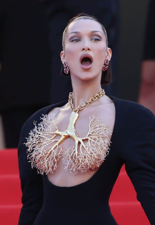 US model Bella Hadid arrives for the screening of the film “Tre Piani” (Three Floors) at the 74th edition of the Cannes Film Festival in Cannes, southern France, on July 11, 2021.