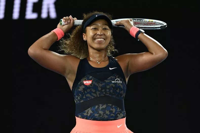 Naomi Osaka celebrates winning championship point in her Women’s Singles Final match against Jennifer Brady of the United States during day 13 of the 2021 Australian Open.