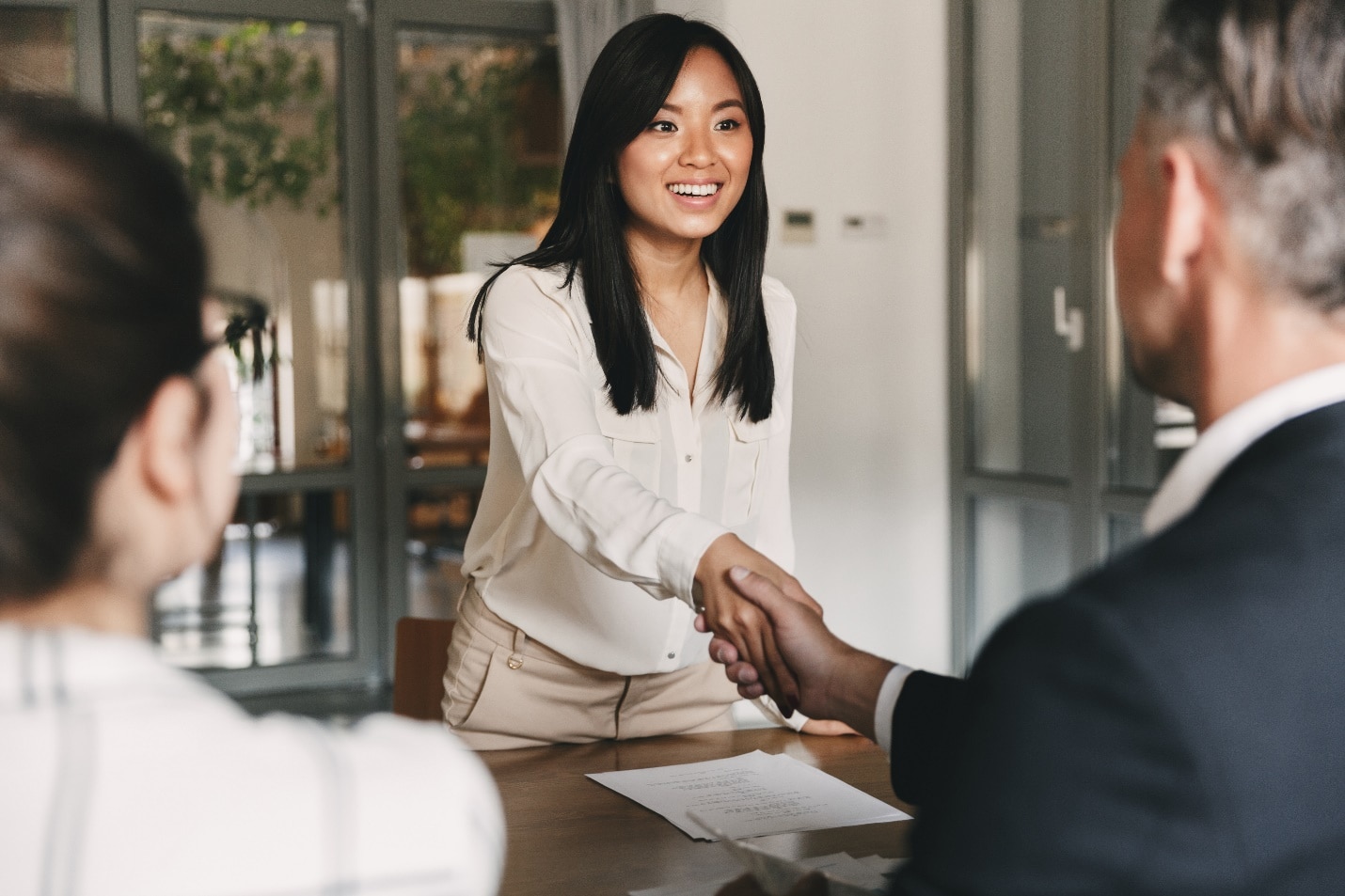 A person talking to a group of peopleDescription automatically generated with low confidence