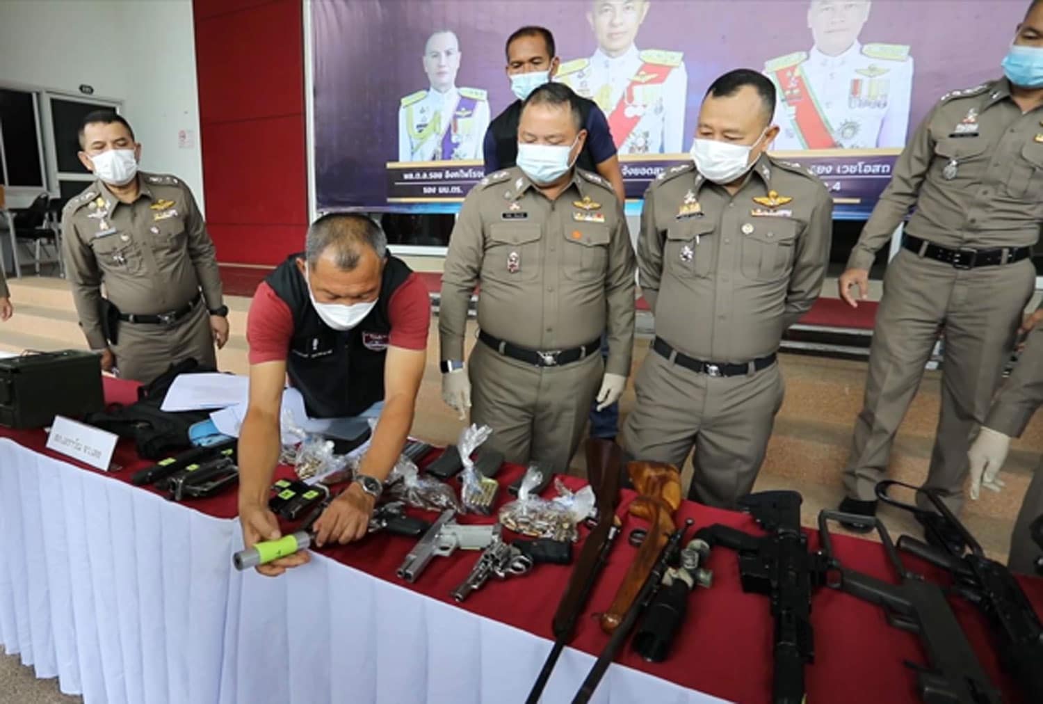 Police in northeastern Thailand on Wednesday seized more than 20 weapons, ammunition and some illegal drugs during a raid in Loei province.