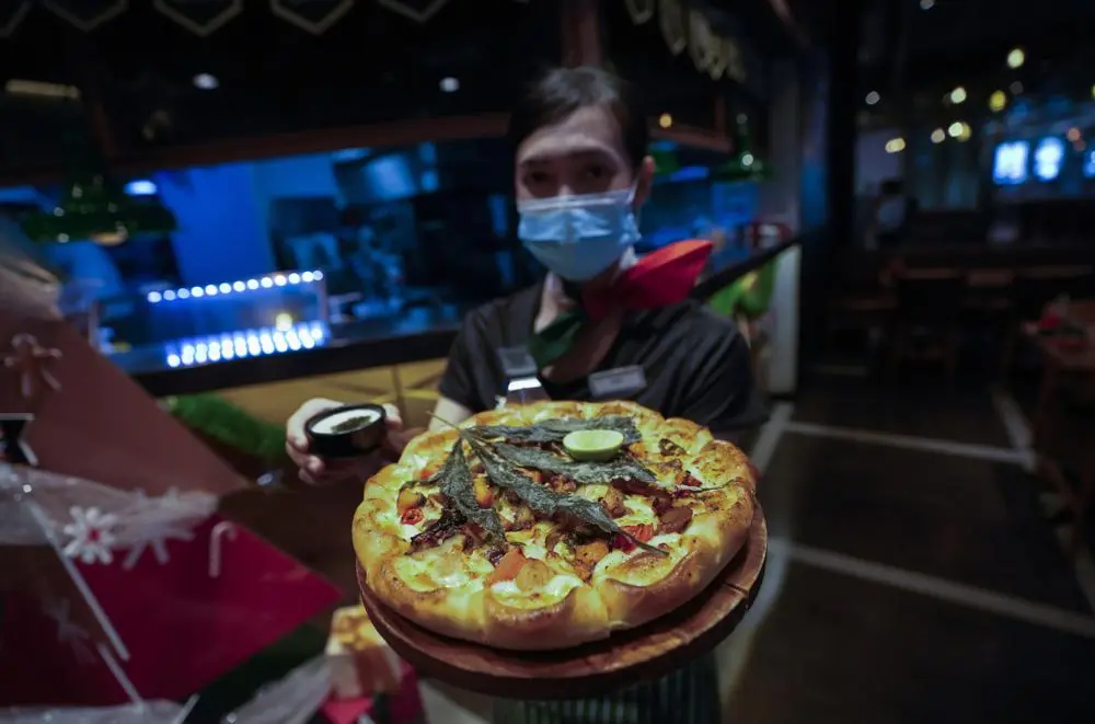 Food Chain in Thailand Promotes Cannabis Crazy Happy Pizza