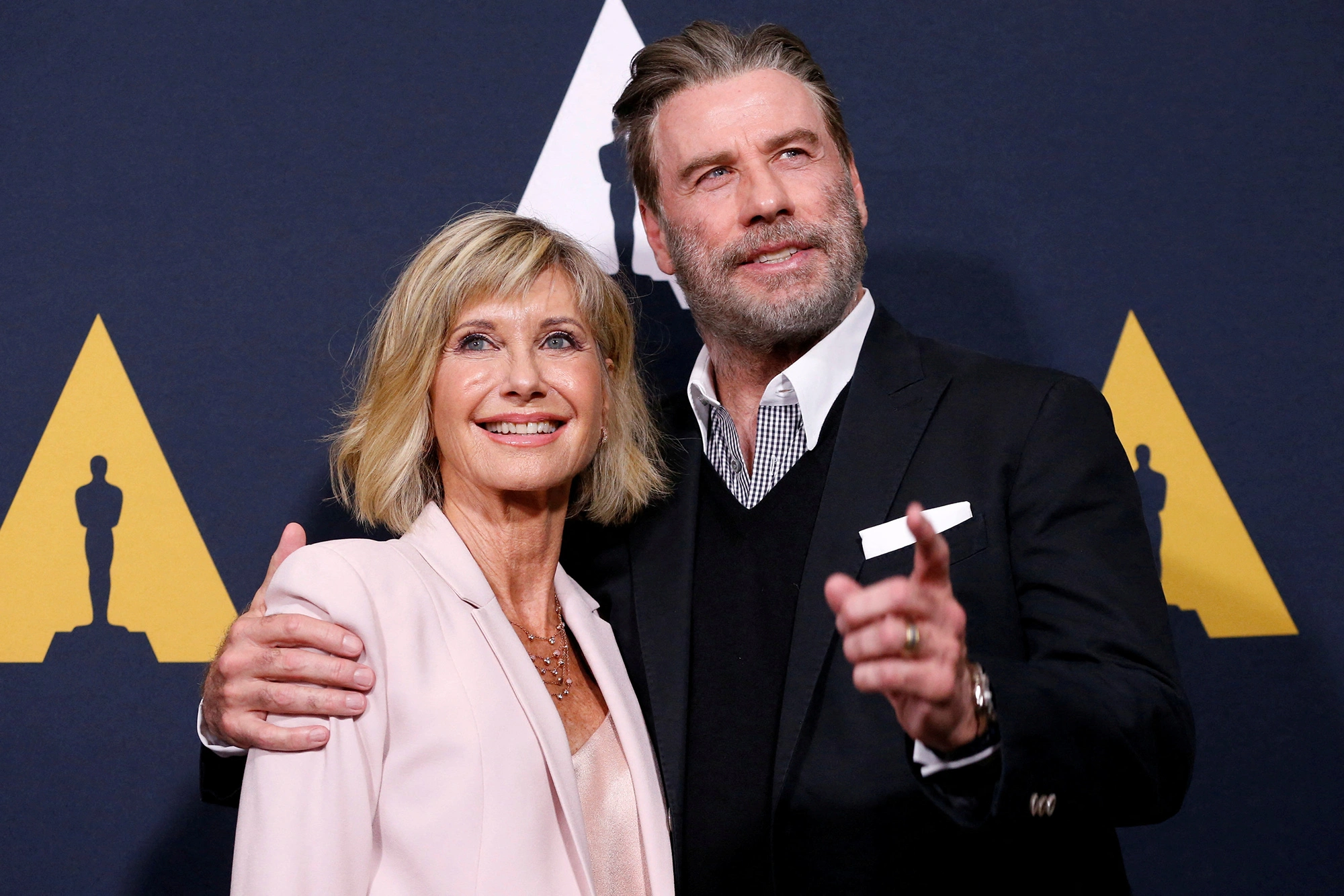 John Travolta Pat Tribute to Olivia Newton-John