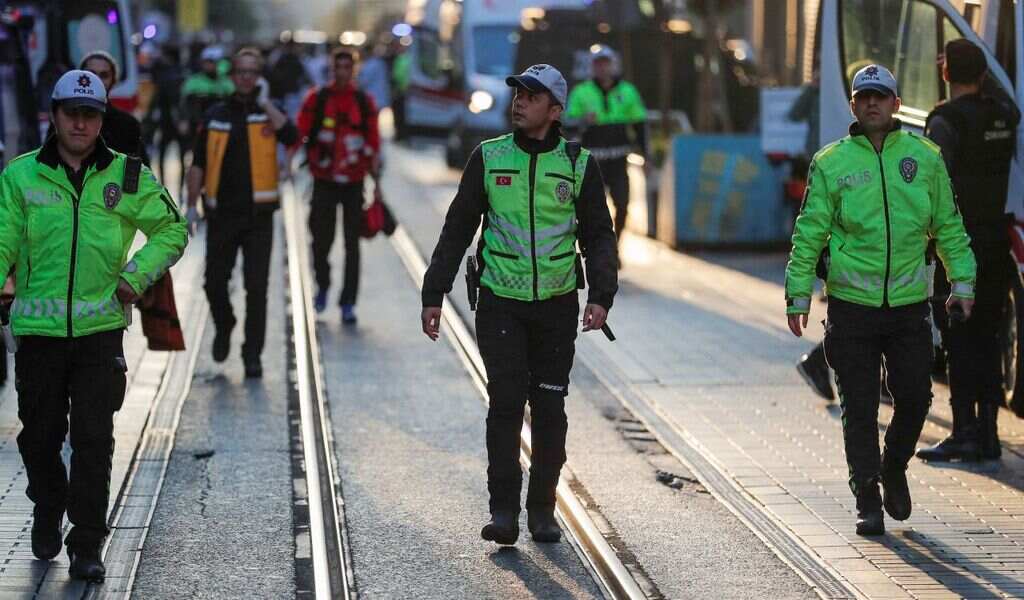 Turkish police near the scene in Istiklal Street on Sunday.