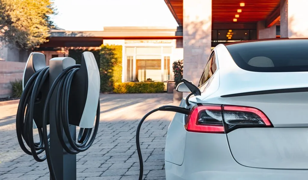 In North America, Tesla has a network of chargers that, for the most part, can only charge Tesla automobiles as one of its main competitive advantages. According to Tesla, there are two times as many Tesla chargers as so-called CCS chargers, the kind used by Ford, General Motors, Audi, Rivian, and other automakers. Currently, Tesla is inviting other automakers to design vehicles with charging ports compatible with its charging format as well as other charging businesses, such as EVGo, ChargePoint, and Electrify America, to upgrade their chargers with Tesla-style plugs. However, it's not yet known if or when other businesses will decide to accept Tesla's offer. With a straightforward adapter that slips over the charging connector, Tesla owners have had access to CCS chargers for a long time. But having a Tesla-style charging cord would simplify the procedure and eliminate the need to buy an adaptor. Tesla has now given the cord the name "North American Charging Standard," or NACS, though it is not an official designation by any government body. The ability to utilise a Tesla Supercharger, the company's term for its rapid chargers, for non-Tesla vehicles has been more challenging and at best calls for a specialised adapter acquired from another business. Due to variations in how cars connect with the charger, it might not function even then. Driving a vehicle with a NACS charging port in the Tesla design will make it much simpler. But to date, neither manufacturers nor charging businesses have indicated they intend to accept Tesla's offer, which was made public in a blog post on Friday. The business and its CEO, Elon Musk, have previously discussed making its charging network available to vehicles other than Teslas. The business started doing this in Europe, where Tesla vehicles come with European-specific CCS-style charging connections, which are the industry standard. The charging company EVGo offered a temporary offer for Tesla drivers with a CCS adapter to use EVGo fast charging stations without paying monthly subscription costs on the same day Tesla unveiled its offer for other businesses to utilise its charging format. Tesla drivers can utilise the EVGo phone app to plug in and instantly begin a charging session under the current Autocharge+ EVGo plan. According to EVGo Commercial Officer Jonathan Levy, the timing of the company's promotional release was accidental, and there are no current plans for EVGo to begin installing Tesla charging cables at its stations. In the past, Tesla has offered to let other businesses utilise certain technologies that are protected by Tesla patents, but doing so required that they follow Tesla's "Patent Pledge." In order to use any Tesla technology, businesses had to sign an agreement stating that they would not sue Tesla or assist any other business in doing the same. This effectively turned Tesla's offer of intellectual sharing into a two-way street. It's not clear if the use of the NACS charging standard is covered by Tesla's Patent Pledge. Tesla, which ordinarily doesn't reply to inquiries from the media, didn't respond to emails on the subject. The Society of Automotive Engineers' (SAE) editorial director, Bill Visnic, asserted that he would not anticipate automakers accepting Tesla's offer. CCS is a standard that was created by the SAE and a group of automakers. He said that "a lot of significant work and collaboration" had gone into it. But even Visnic acknowledged that Tesla chargers are frequently more dependable and user-friendly than conventional public chargers. Since Tesla already has a larger network of chargers and many Tesla drivers can easily use an adapter, Visnic predicted that charging companies will want to keep their chargers using the CCS standard. (Some Tesla models are incompatible with CCS adapters.) However, Jim Burness, CEO of National Car Charging, a reseller of equipment to the EV charging sector, suggested that charging businesses could wish to add these cables since it might attract new clients. Burness drives a Tesla for personal use. Because the socket is already there on the station, he said, "this will help owners of the older Teslas who would otherwise have to not only buy an adaptor, but also pay for a retrofit of their car." The business claims to have changed the name of their charging connector to the North American Charging Standard (NACS) and contends that this standard is preferable to CCS because of its greater technology and geographic reach.