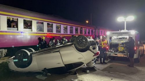 Car hit by passenger train