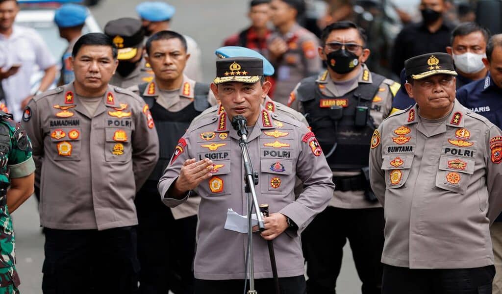 Indonesia Automatic Fingerprint Identification System (INAFIS) officers investigate following a blast at a district police station, that according to authorities was a suspected suicide bombing, in Bandung, West Java province, Indonesia, December 7, 2022.