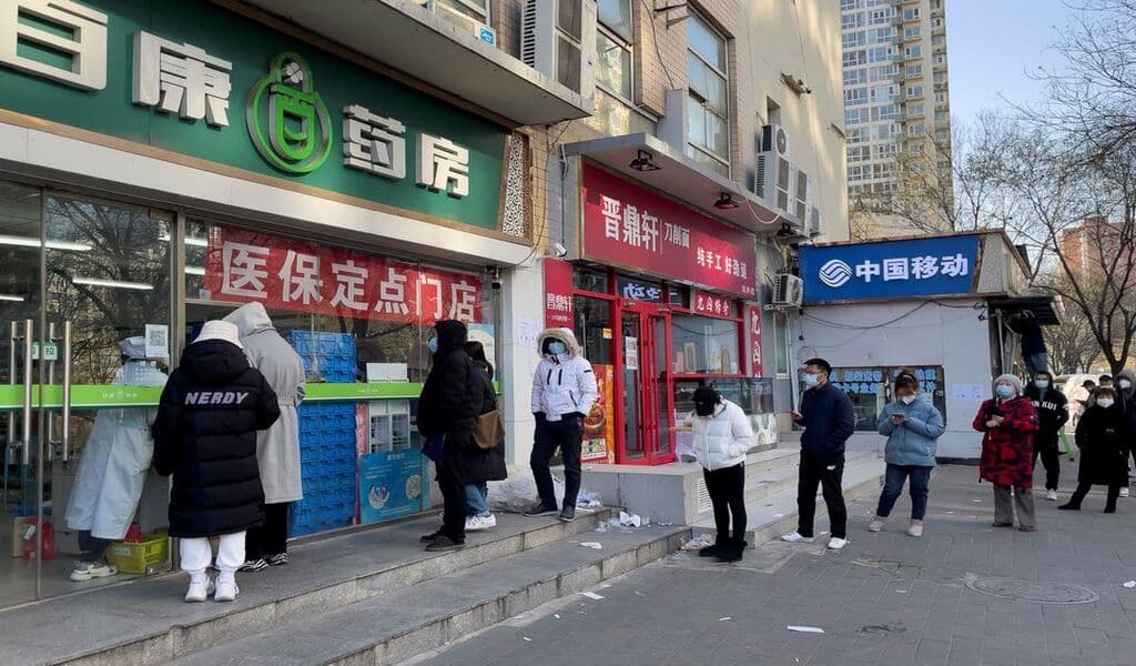 China's Hope Of Looser COVID Rules Prompts Fever Drug Rush
