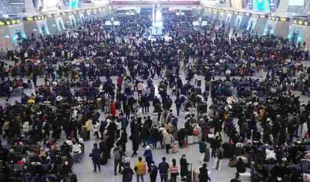 Covid Outbreak In China Downplayed With Holiday Rush