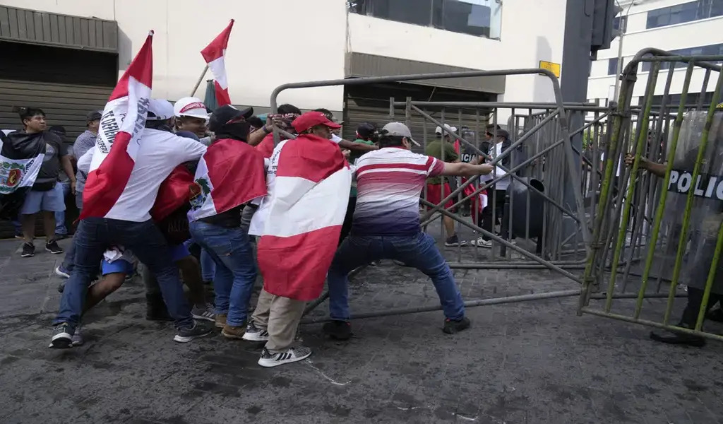 Peruvian Police Use Tear Gas To 3
