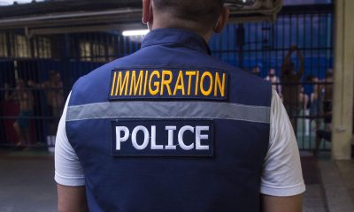 Immigration Police Arrest 2 Chinese Nationals on Fraud Charges