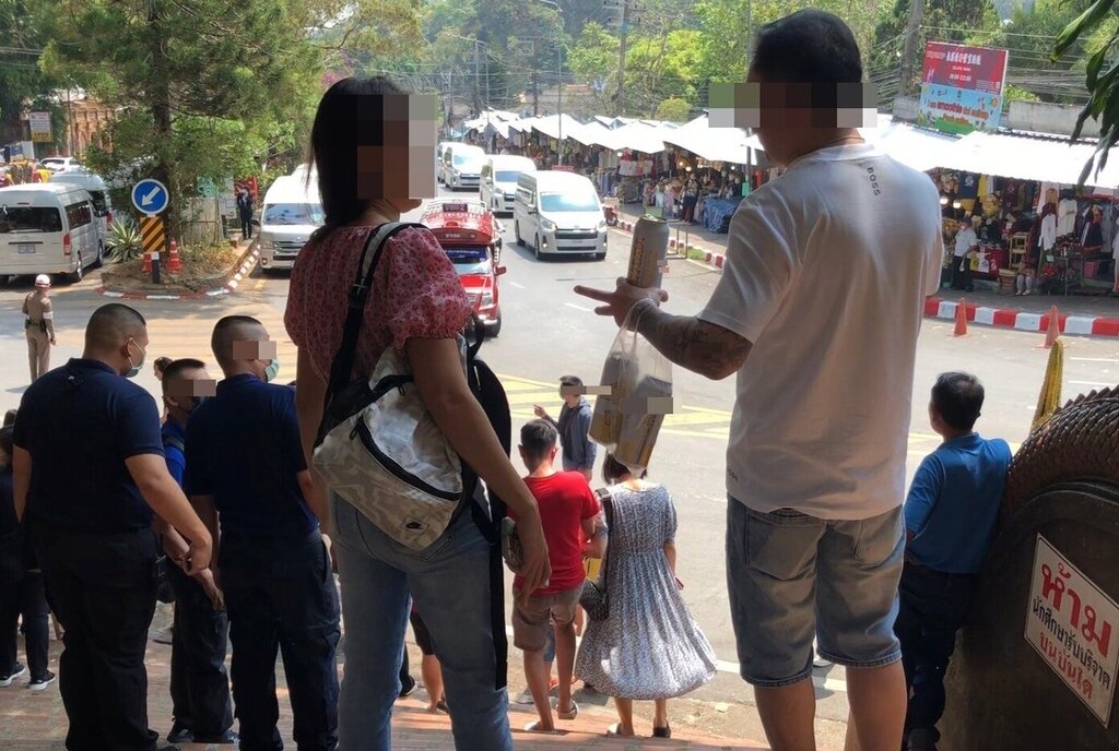 Foreigner Drinking Beer at Chiang Mai Temple