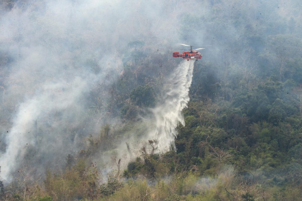 Helicopters Fight Forest Fire