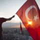 Turkey's Lira Sinks To Near Record Lows As Erdogan Wins Re-Election