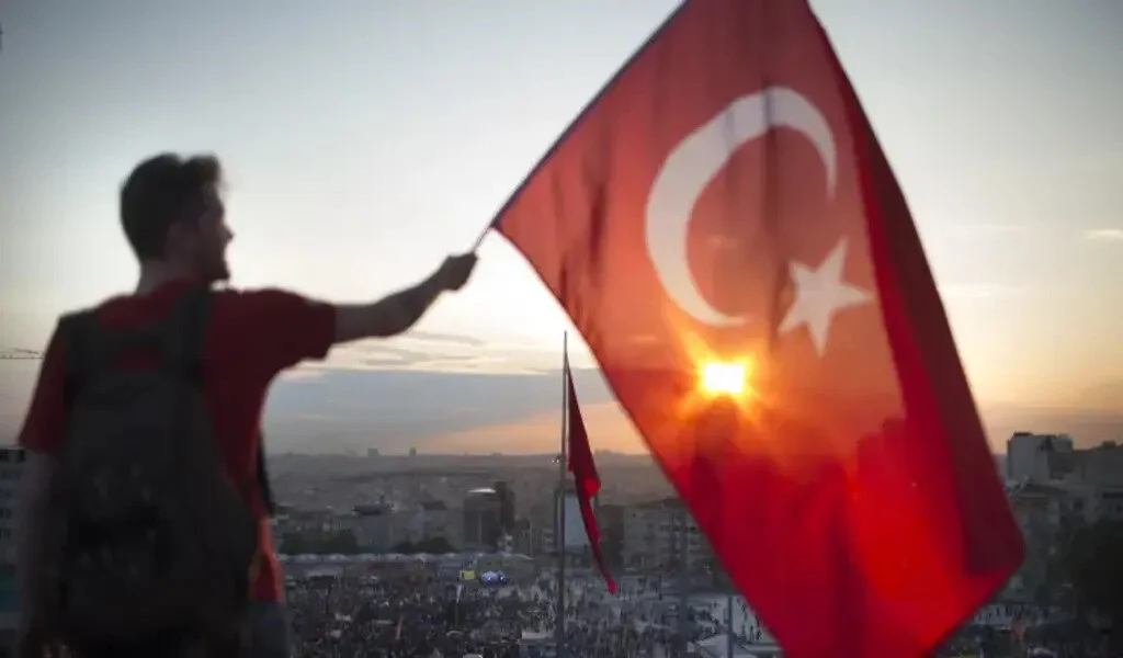Turkey's Lira Sinks To Near Record Lows As Erdogan Wins Re-Election
