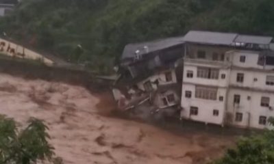 Building Collapses into Raging River in Southwestern China