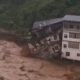 Building Collapses into Raging River in Southwestern China