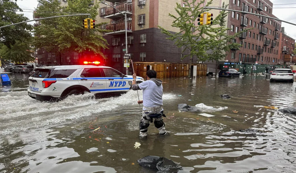 New York Gets One Of Its Wettest Days In Decades, as rain swamps subways and streets