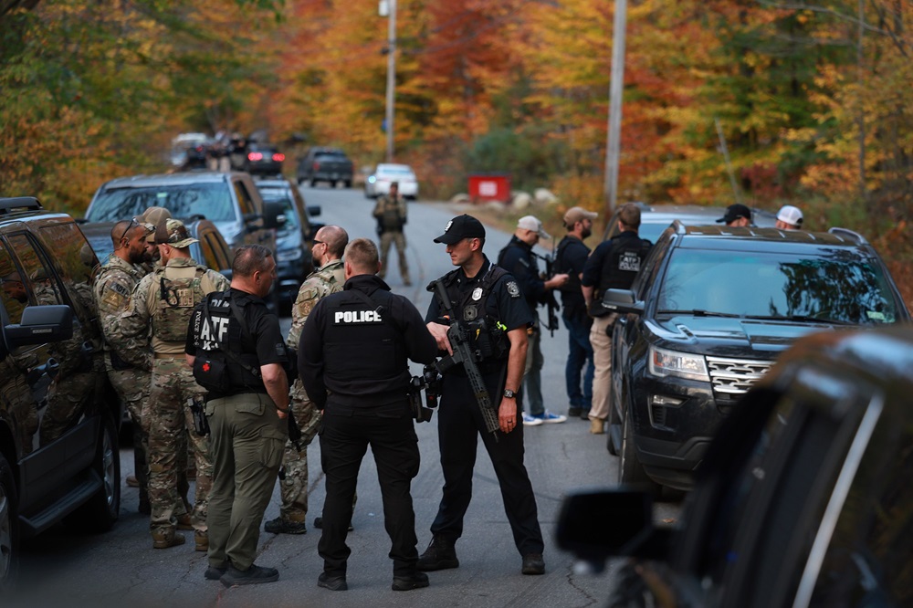 Maine Manhunt Continues for Army Reservist Who Gunned Down 18 People