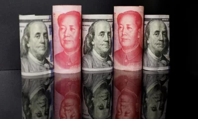 Yuan Slips Against Dollar as Investors Await China's November Manufacturing Data