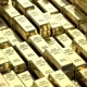 Gold Prices Reach Record Highs Of $2,100, Analysts Say