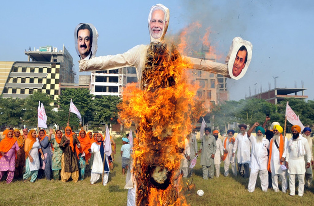 Farmers in India Burn Effigy of Modi Over Brutal Attacks from Police