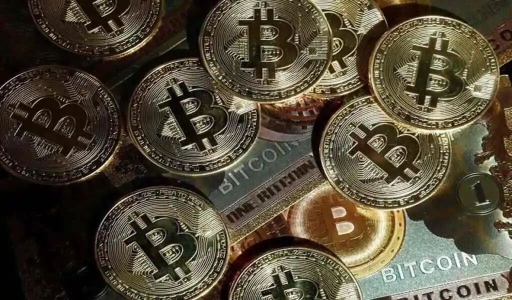 Bitcoin Prices Hit Record Highs Above $71,000 As Demand Rises
