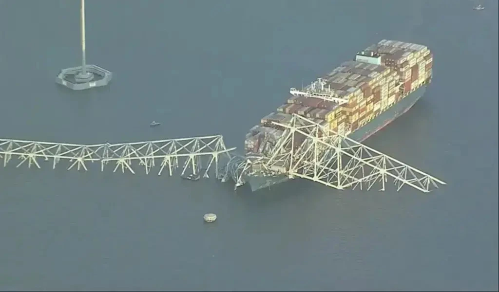 The Baltimore Bridge Collapses After a Cargo Ship Rams a Support Column