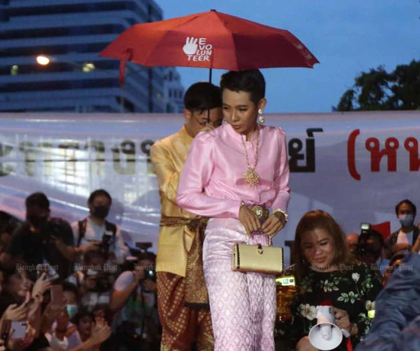 Jatuporn Sae Ung, 25, dressed to emulate the Queen during a demonstration in the Silom area of Bangkok