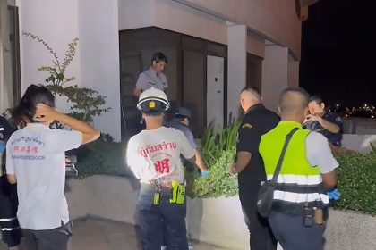 Rescuers respond to the scene of a fatal fall at a Pattaya hotel on Saturday.