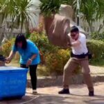 Policeman Saves Woman from Attacking Bees