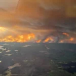 Canada’s Wildfire Crisis Over 17,000 Evacuated as Flames Engulf Manitoba
