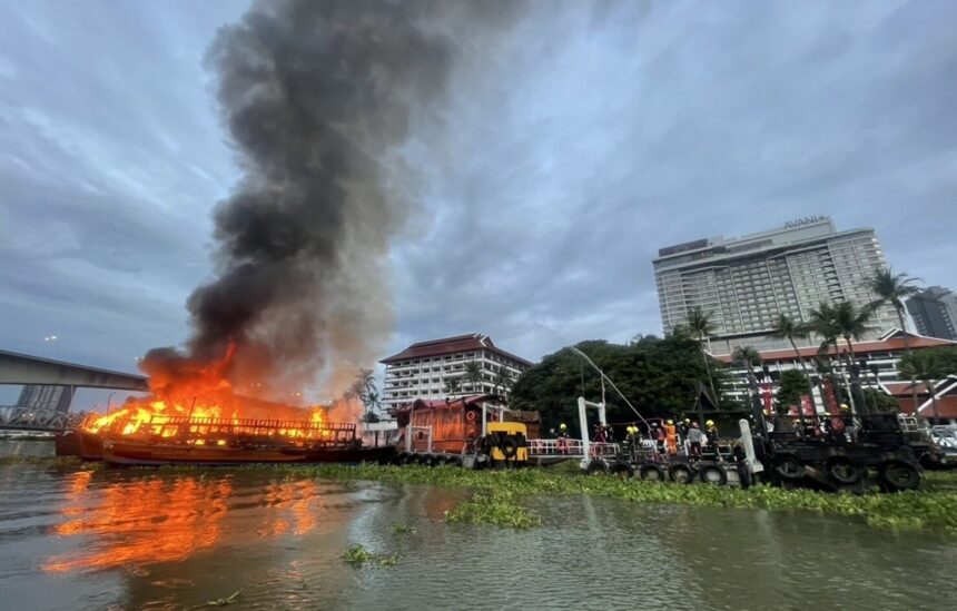 Fire Destroys Tourist Boats Near Luxury Bangkok Hotel by Chao Phraya River