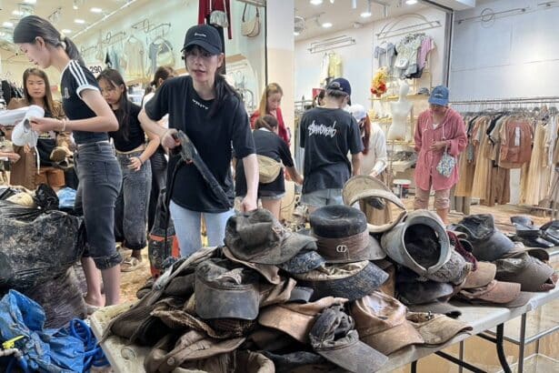 Vendors at Sai Lom Joy Market in Mae Sai Sell-Off Flood-Damaged Goods