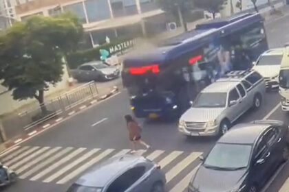 Student Survives Being Hit By Bus on Zebra Crossing in Bangkok
