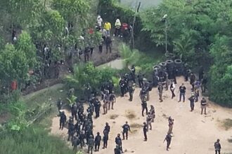 Thailand's Riot Police Fire Tear Gas and Rubber Bullets at Cambodian ProtestersÂ