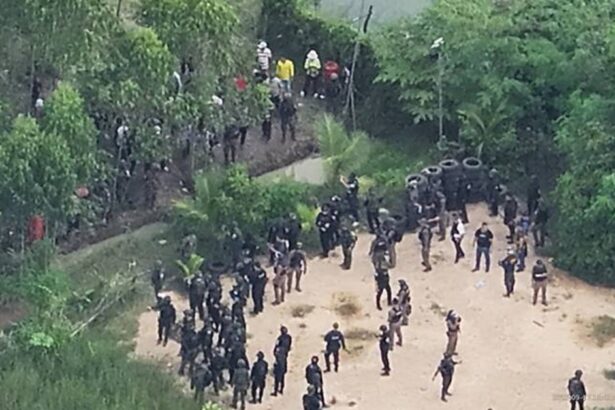 Thailand's Riot Police Fire Tear Gas and Rubber Bullets at Cambodian Protesters 