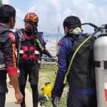 Rescue Workers Search for Missing Diver