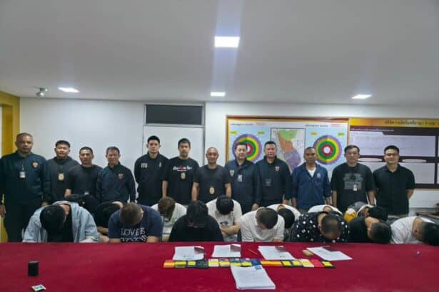 Police Detain 14 Chinese Scammers