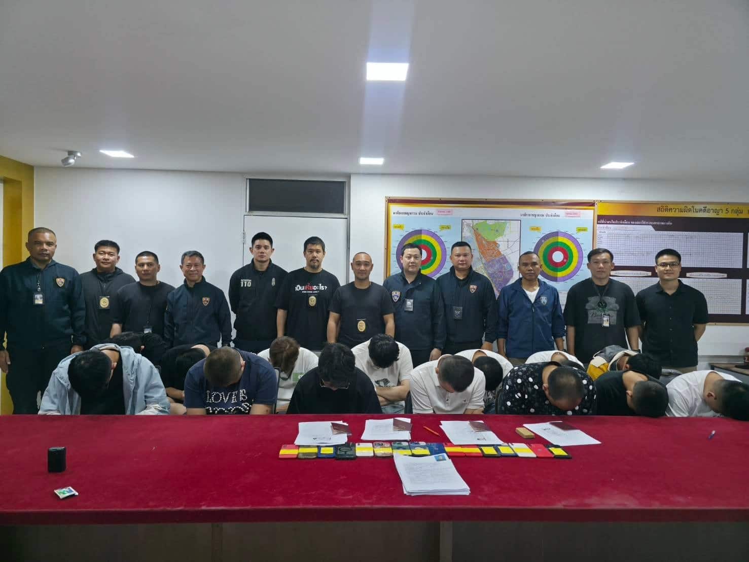 Police Detain 14 Chinese Scammers