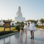 Family visiting Wat Huay Pla Kang in Chiang Rai near the Guan Yin statue.