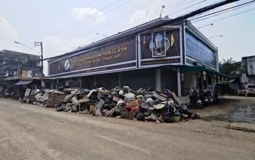 The garbage and damaged debris is piled up on streets in Chiang Mai - CTN Image